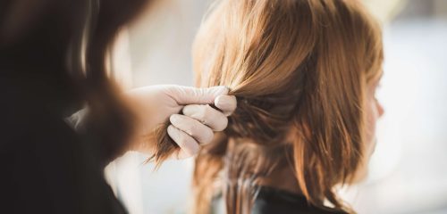 woman-getting-her-hair-styled-at-hair-salon-2026-03-24-22-43-55-utc
