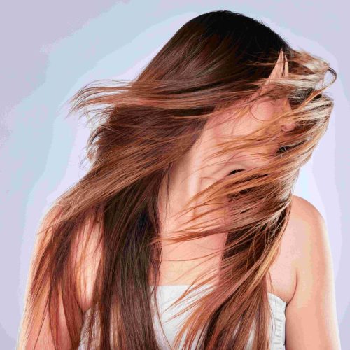 woman-with-flowing-hair-in-studio-setting-2026-03-25-02-43-36-utc